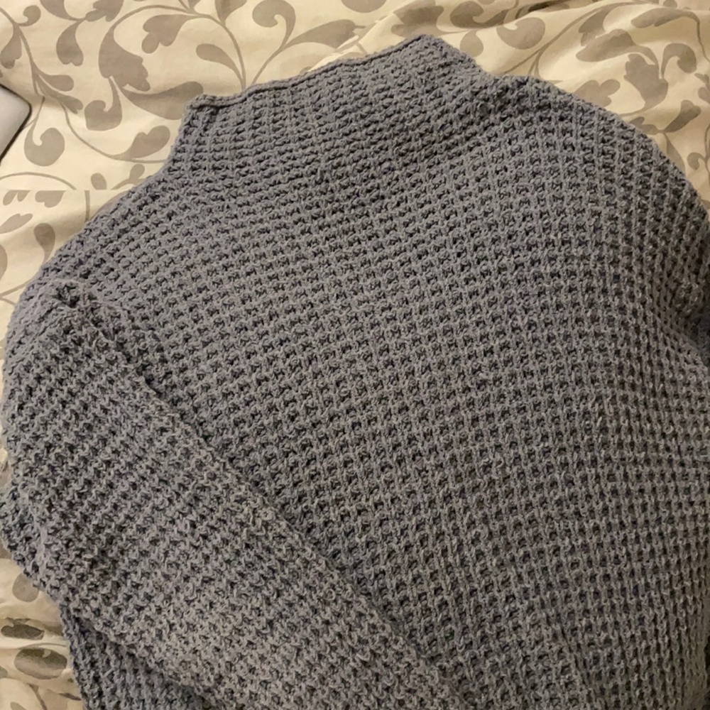 Blue knitted sweater
